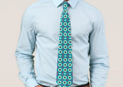 Turquoise and Red Geometric Pattern Tie